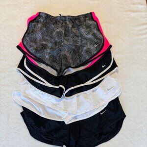 4 pairs of Nike Dri-fit running shorts